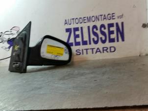 Usagé Rétroviseur extérieur droit Hyundai Matrix 1.6 16V Prix € 42,00 Règlement à la marge proposé par Zelissen V.O.F. autodemontage