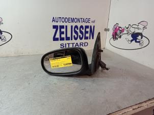 Używane Lusterko zewnetrzne lewe Nissan Almera (N16) 1.5 16V Cena € 26,25 Procedura marży oferowane przez Zelissen V.O.F. autodemontage