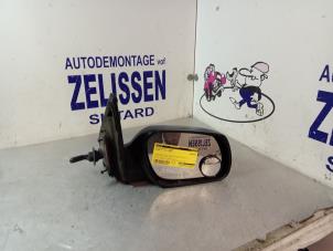 Usagé Rétroviseur extérieur droit Mazda 2 (NB/NC/ND/NE) 1.25 16V Prix € 26,25 Règlement à la marge proposé par Zelissen V.O.F. autodemontage