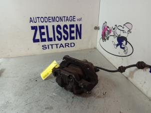 Used Front brake calliper, left BMW 3 serie Touring (E91) 318d 16V Price € 47,25 Margin scheme offered by Zelissen V.O.F. autodemontage