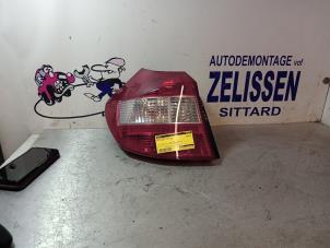 Used Taillight, left BMW 1 serie (E87/87N) 116i 1.6 16V Price € 42,00 Margin scheme offered by Zelissen V.O.F. autodemontage