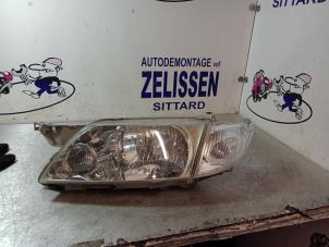 Used Headlight, left Mazda Premacy 1.8 16V Price € 36,75 Margin scheme offered by Zelissen V.O.F. autodemontage