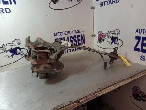 Used Rear suspension system, right Mini Mini (R56) 1.6 16V One Price € 141,75 Margin scheme offered by Zelissen V.O.F. autodemontage