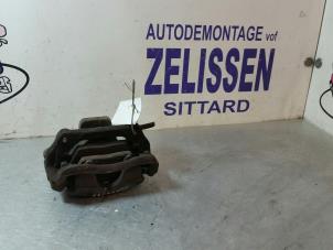 Used Front brake calliper, right Mini Mini (R56) 1.6 16V One Price € 42,00 Margin scheme offered by Zelissen V.O.F. autodemontage