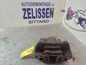 Used Front brake calliper, left Volvo V70 (SW) 2.4 20V 140 Price € 42,00 Margin scheme offered by Zelissen V.O.F. autodemontage
