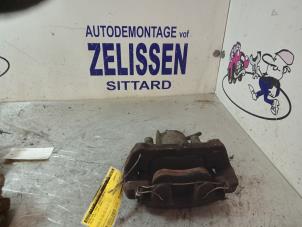 Used Front brake calliper, right Volvo V70 (SW) 2.4 20V 140 Price € 42,00 Margin scheme offered by Zelissen V.O.F. autodemontage