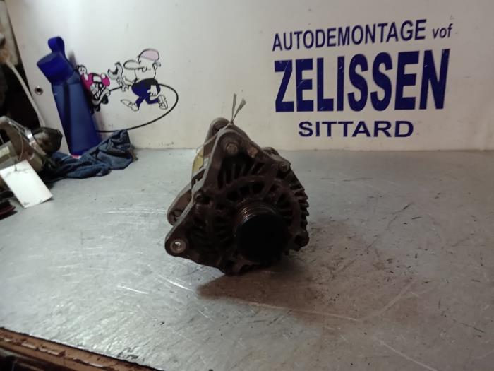 Dynamo van een Renault Megane III Grandtour (KZ) 1.4 16V TCe 130 2010