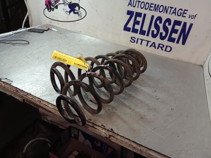 Rear coil spring from a Volkswagen Eos (1F7/F8) 1.6 FSI 16V 2007