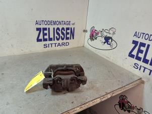 Used Front brake calliper, left BMW 3 serie (E90) 318i 16V Price € 42,00 Margin scheme offered by Zelissen V.O.F. autodemontage
