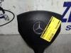 Left airbag (steering wheel) from a Mercedes-Benz A (W169) 2.0 A-180 CDI 16V 5-Drs. 2005