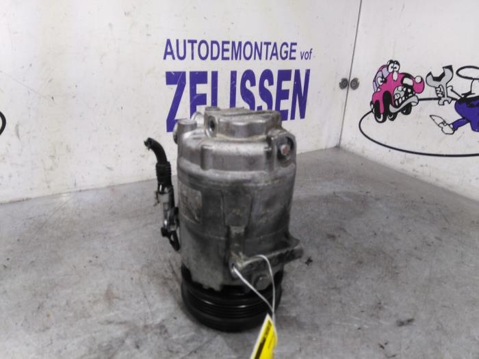 Air conditioning pump from a Opel Astra H SW (L35) 1.8 16V 2006