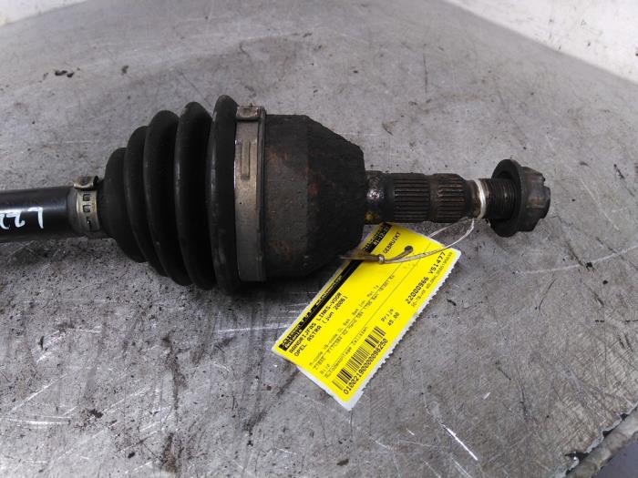Front drive shaft, left from a Opel Astra H SW (L35) 1.8 16V 2006