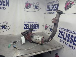 Used Exhaust manifold + catalyst Peugeot 1007 (KM) 1.4 16V Price on request offered by Zelissen V.O.F. autodemontage