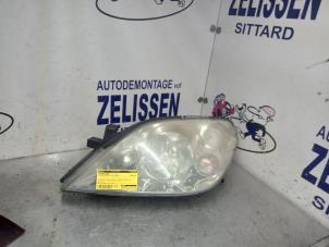 Used Headlight, left Nissan Primera (P12) 1.8 16V Price € 52,50 Margin scheme offered by Zelissen V.O.F. autodemontage