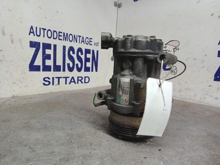 Usagé Compresseur de clim Dacia Sandero I (BS) 1.2 16V Prix € 105,00 Règlement à la marge proposé par Zelissen V.O.F. autodemontage