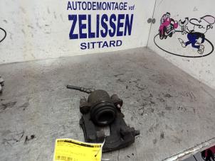 Used Front brake calliper, left Volkswagen Polo V (6R) 1.2 TSI 16V BlueMotion Technology Price € 52,50 Margin scheme offered by Zelissen V.O.F. autodemontage