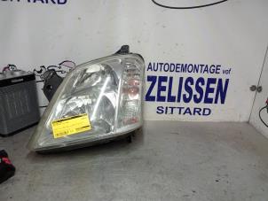 Usagé Phare gauche Opel Meriva 1.7 DTI 16V Prix € 36,75 Règlement à la marge proposé par Zelissen V.O.F. autodemontage