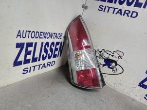 Used Taillight, left Daihatsu Sirion 2 (M3) 1.3 16V DVVT Price € 36,75 Margin scheme offered by Zelissen V.O.F. autodemontage