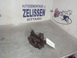 Used Front brake calliper, left Daihatsu Sirion 2 (M3) 1.3 16V DVVT Price € 31,50 Margin scheme offered by Zelissen V.O.F. autodemontage