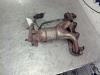 Exhaust manifold + catalyst from a Volkswagen Lupo (6X1) 1.4 60 2004
