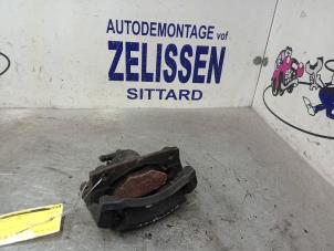 Used Front brake calliper, left Toyota Aygo (B10) 1.0 12V VVT-i Price € 31,50 Margin scheme offered by Zelissen V.O.F. autodemontage