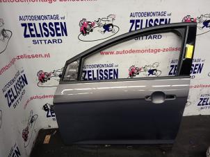 Używane Drzwi lewe przednie wersja 4-drzwiowa Ford Focus 3 Wagon 1.6 TDCi Cena € 210,00 Procedura marży oferowane przez Zelissen V.O.F. autodemontage