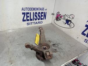 Usagé Suspension de roue avant gauche Nissan Note (E11) 1.6 16V Prix € 52,50 Règlement à la marge proposé par Zelissen V.O.F. autodemontage