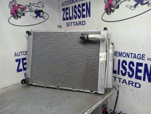 Used Radiator Nissan Note (E11) 1.6 16V Price € 42,00 Margin scheme offered by Zelissen V.O.F. autodemontage