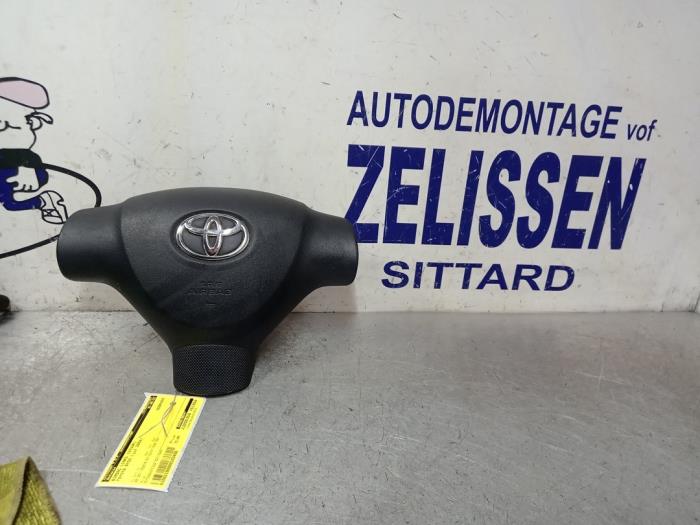Left airbag (steering wheel) from a Toyota Aygo (B10) 1.4 HDI 2008