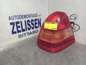 Used Taillight, left Mercedes C (W202) 1.8 C-180 16V Price € 36,75 Margin scheme offered by Zelissen V.O.F. autodemontage