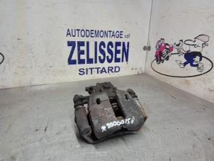 Used Front brake calliper, right Mitsubishi Colt (Z2/Z3) 1.3 16V Price € 47,25 Margin scheme offered by Zelissen V.O.F. autodemontage