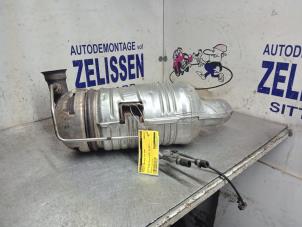 Used Particulate filter Peugeot 206+ (2L/M) 1.4 HDi Eco 70 Price € 350,00 Margin scheme offered by Zelissen V.O.F. autodemontage