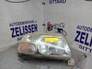 Used Headlight, right Suzuki Grand Vitara I (FT/GT/HT) 2.0 TDi 16V Price € 42,00 Margin scheme offered by Zelissen V.O.F. autodemontage