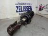 Front shock absorber rod, left from a Opel Corsa C (F08/68) 1.0 12V Twin Port 2005