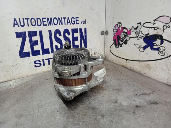 Begagnade Dynamo Nissan Note (E11) 1.6 16V Pris € 42,00 Marginaltabell erbjuds av Zelissen V.O.F. autodemontage