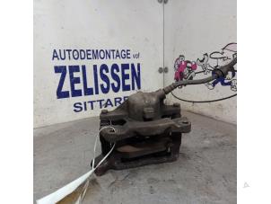 Usagé Etrier de frein (pince) avant droit Renault Scénic I (JA) 1.6 16V Prix € 36,75 Règlement à la marge proposé par Zelissen V.O.F. autodemontage