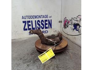 Used Front suspension system, left Nissan Note (E11) 1.6 16V Price € 52,50 Margin scheme offered by Zelissen V.O.F. autodemontage