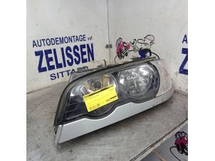 Used Headlight, left BMW 3 serie (E46/2) 318 Ci Price € 78,75 Margin scheme offered by Zelissen V.O.F. autodemontage
