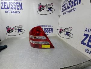 Used Taillight, left Mercedes C (W203) 1.8 C-180K 16V Price € 57,75 Margin scheme offered by Zelissen V.O.F. autodemontage