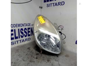 Używane Reflektor prawy Daihatsu Sirion/Storia (M1) 1.0 12V Cena € 36,75 Procedura marży oferowane przez Zelissen V.O.F. autodemontage