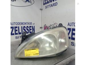 Used Headlight, left Opel Corsa C (F08/68) 1.2 16V Twin Port Price € 26,25 Margin scheme offered by Zelissen V.O.F. autodemontage