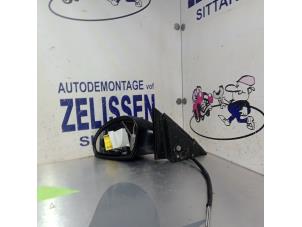 Używane Lusterko zewnetrzne lewe Seat Ibiza III (6L1) 1.4 16V 75 Cena € 21,00 Procedura marży oferowane przez Zelissen V.O.F. autodemontage