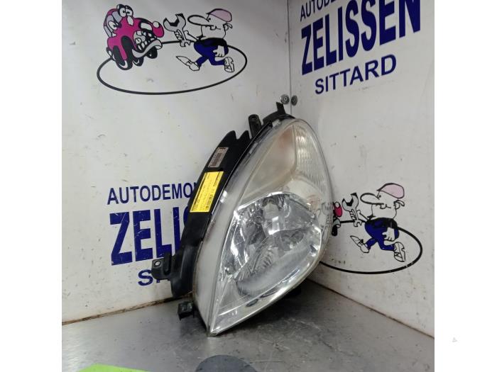 Headlight, left from a Citroën Xsara Picasso (CH) 1.8 16V 2005