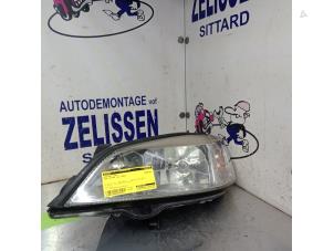 Używane Reflektor lewy Opel Astra G (F08/48) 1.2 16V Cena € 26,25 Procedura marży oferowane przez Zelissen V.O.F. autodemontage