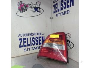 Gebrauchte Rücklicht links Opel Astra G (F08/48) 1.2 16V Preis € 26,25 Margenregelung angeboten von Zelissen V.O.F. autodemontage