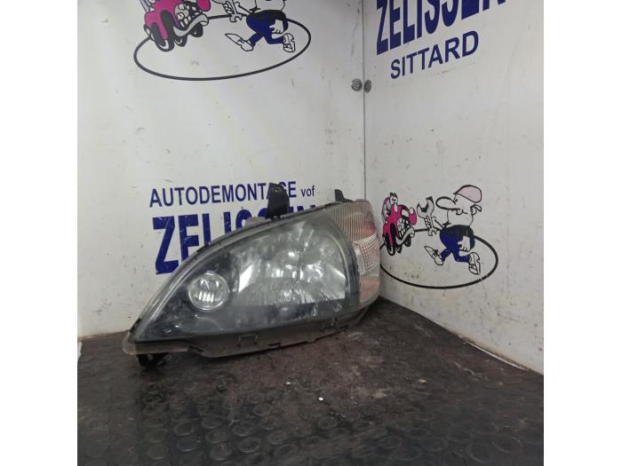 Używane Reflektor lewy Daihatsu YRV (M2) 1.0 12V DVVT STi Cena € 42,00 Procedura marży oferowane przez Zelissen V.O.F. autodemontage
