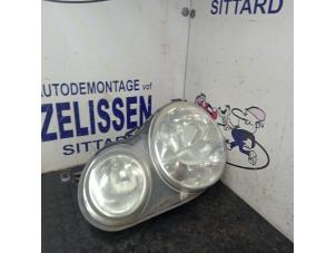 Used Headlight, left Volkswagen Polo IV (9N1/2/3) 1.4 16V Price € 47,25 Margin scheme offered by Zelissen V.O.F. autodemontage