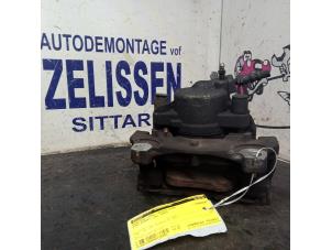 Używane Zacisk hamulcowy prawy przód Ford Mondeo IV Wagon 2.0 16V Flexifuel Cena € 52,50 Procedura marży oferowane przez Zelissen V.O.F. autodemontage