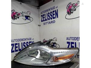 Używane Reflektor lewy Ford Mondeo IV Wagon 2.0 16V Flexifuel Cena € 204,75 Procedura marży oferowane przez Zelissen V.O.F. autodemontage