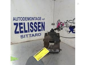 Used Front brake calliper, left Volkswagen Polo V (6R) 1.2 TDI 12V BlueMotion Price € 42,00 Margin scheme offered by Zelissen V.O.F. autodemontage